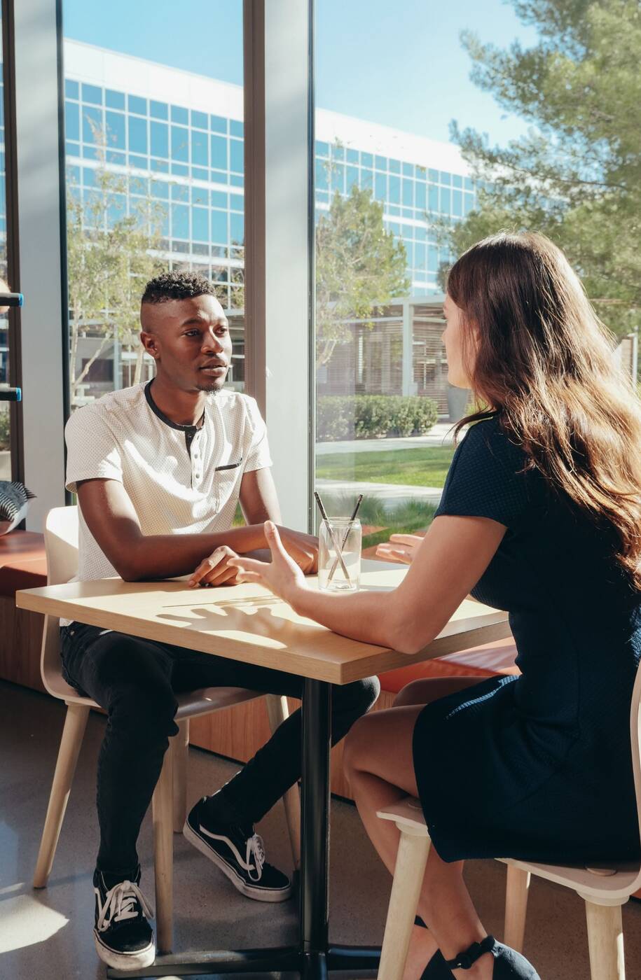 A staff member listening to a person during a conversation