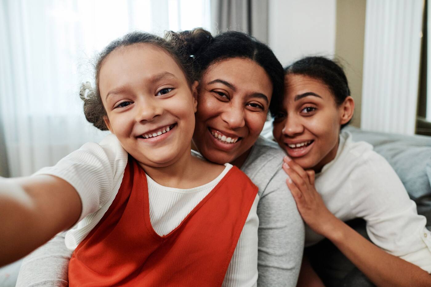 A smiling family spending time together at home